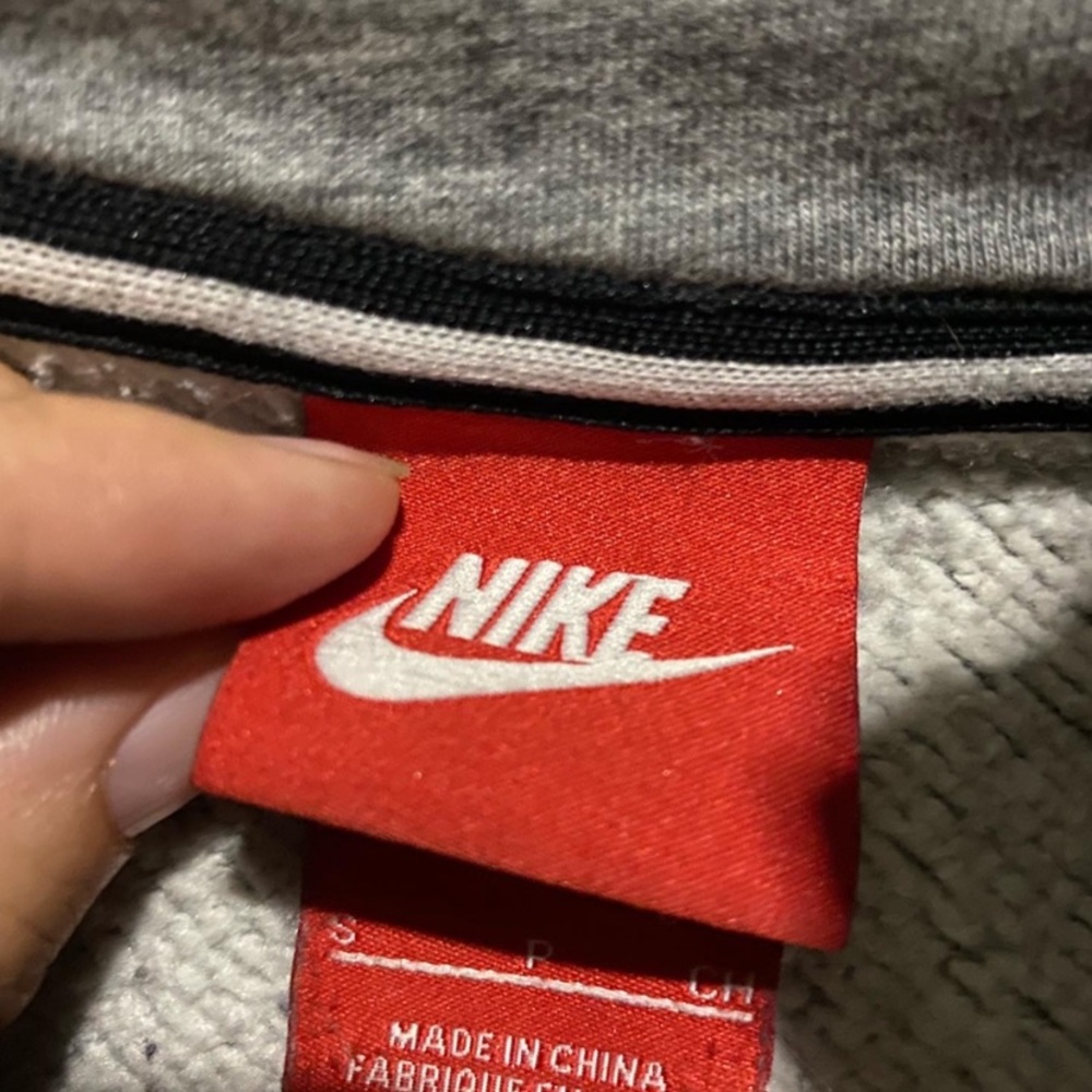 Nike zip up sweater.
